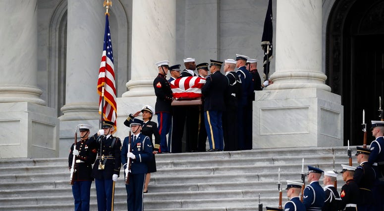 President Bush's casket leaving the U.S. Capitol