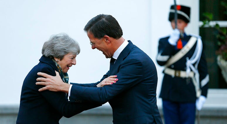 Dutch Prime Minister greeting Theresa May