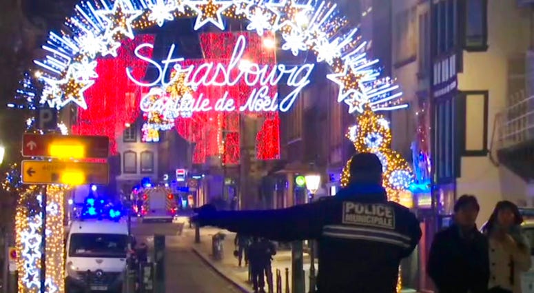 In this image made from video, emergency services arrive on the scene of a Christmas market in Strasbourg, France, Tuesday, Dec. 11, 2018. (AP Photo)
