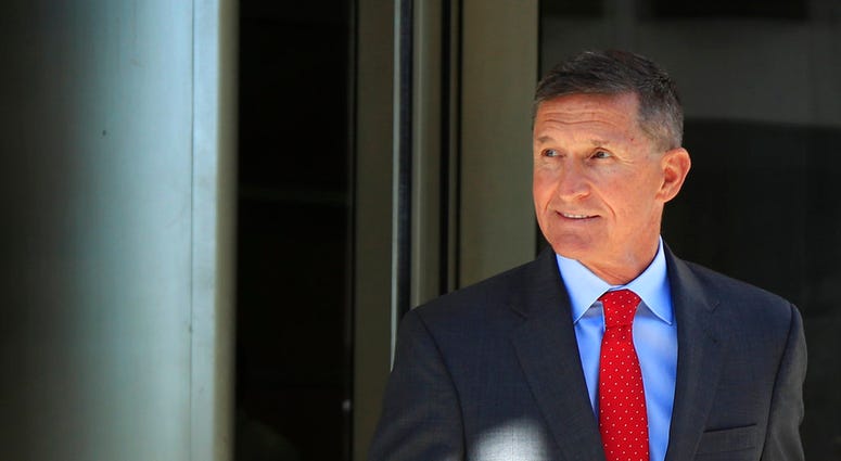 FILE - In this July 10, 2018, file photo, former Trump national security adviser Michael Flynn leaves the federal courthouse in Washington, following a status hearing. (AP Photo/Manuel Balce Ceneta, File) FILE - In this July 10, 2018, file photo, former Trump national security adviser Michael Flynn leaves the federal courthouse in Washington, following a status hearing. (AP Photo/Manuel Balce Ceneta, File)