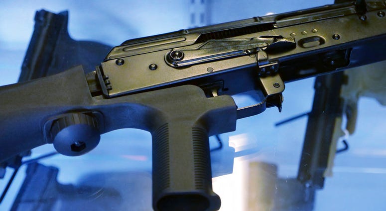 A little-known device called a "bump stock" is attached to a semi-automatic rifle at the Gun Vault store and shooting range in South Jordan, Utah. (AP Photo/Rick Bowmer) A little-known device called a "bump stock" is attached to a semi-automatic rifle at the Gun Vault store and shooting range in South Jordan, Utah. (AP Photo/Rick Bowmer)