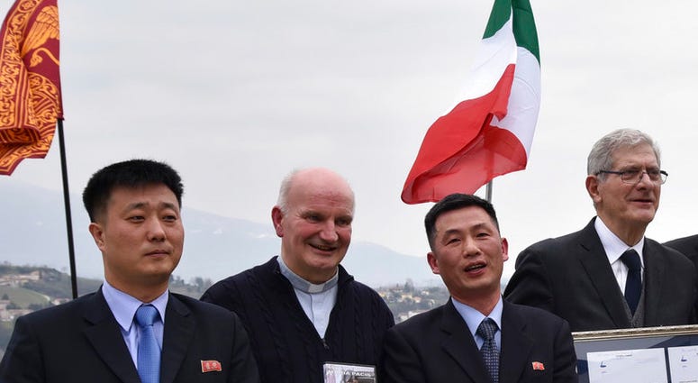 Jo Song Gil (second from right)