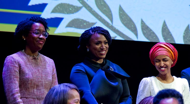 From left, Lauren Underwood D-IL, Ayanna Pressley, D-Mass., and Ilhan Omar D-MN, during the swearing-in ceremony of Congressional Black Caucus members of the 116th Congress at The Warner Theatre in Washington. (AP Photo/Jose Luis Magana) From left, Lauren Underwood D-IL, Ayanna Pressley, D-Mass., and Ilhan Omar D-MN, during the swearing-in ceremony of Congressional Black Caucus members of the 116th Congress at The Warner Theatre in Washington. (AP Photo/Jose Luis Magana)