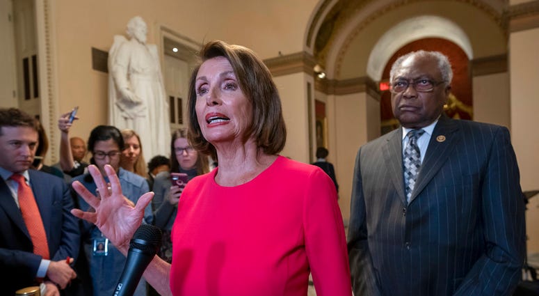 House Speaker Nancy Pelosi talking to reporters