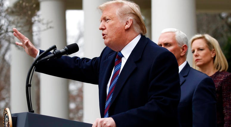 President Donald Trump speaks in the Rose Garden of the White House, as Vice President Mike Pence and Homeland Security Secretary Kirstjen Nielsen listen, after a meeting with Congressional leaders on border security, Friday, Jan. 4, 2019,
