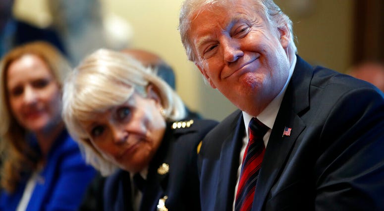 President Donald Trump leads a roundtable discussion on border security with local leaders, Friday, Jan. 11, 2019, in the Cabinet Room of the White House in Washington.