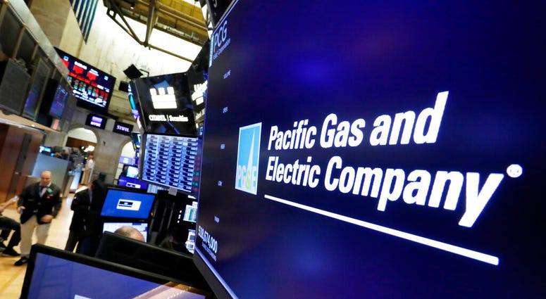 The logo for Pacific Gas & Electric Co. appears above a trading post on the floor of the New York Stock Exchange, Monday, Jan. 14, 2019.