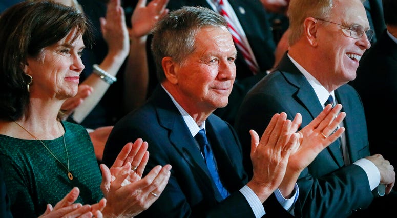 In this Monday, Jan. 14, 2019 photo, former Ohio Gov. John Kasich applauds during a public inauguration ceremony for Gov. Mike DeWine at the Ohio Statehouse, in Columbus, Ohio. (AP Photo/John Minchillo) In this Monday, Jan. 14, 2019 photo, former Ohio Gov. John Kasich applauds during a public inauguration ceremony for Gov. Mike DeWine at the Ohio Statehouse, in Columbus, Ohio. (AP Photo/John Minchillo)