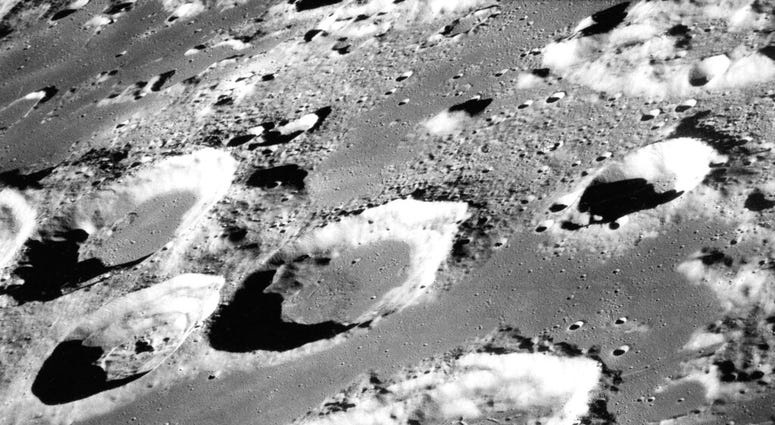 FILE - This Dec. 29, 1968 photo made available by NASA shows the large moon crater Goclenius, foreground. (NASA via AP, File) FILE - This Dec. 29, 1968 photo made available by NASA shows the large moon crater Goclenius, foreground. (NASA via AP, File)