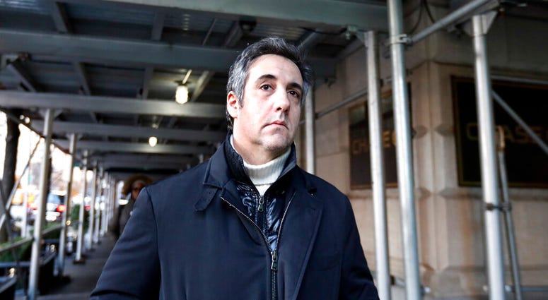 In this Dec. 7, 2018 file photo, Michael Cohen, former lawyer to President Donald Trump, leaves his apartment building in New York.