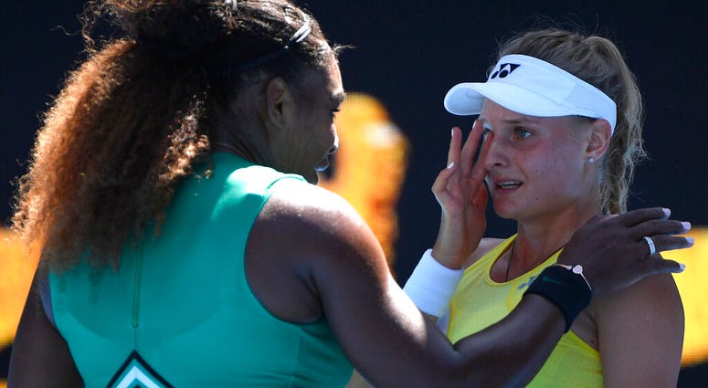United States' Serena Williams consoles Ukraine's Dayana Yastremska after their third round match at the Australian Open tennis championships in Melbourne, Australia, Saturday, Jan. 19, 2019.
