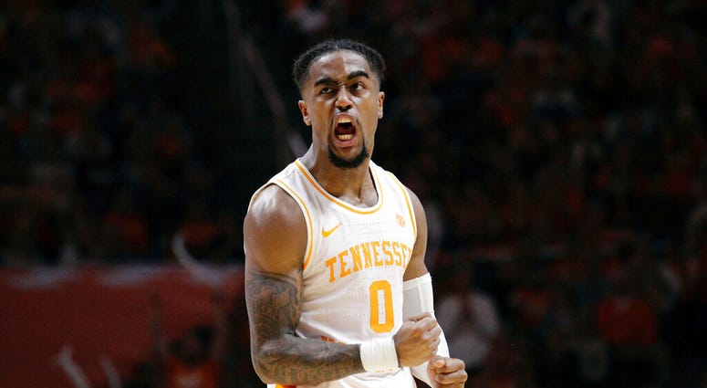Tennessee guard Jordan Bone (0) reacts from a foul made by Alabama in the second half of an NCAA college basketball game, Saturday, Jan. 19, 2019, in Knoxville, Tenn. Tennessee won 71-68