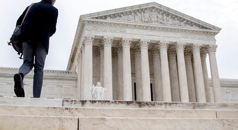 In this Jan. 7, 2019 photo, The Supreme Court in Washington. An unidentified foreign government is asking the Supreme Court to get involved in a case that may be part of special counsel Robert Mueller's Russia investigation