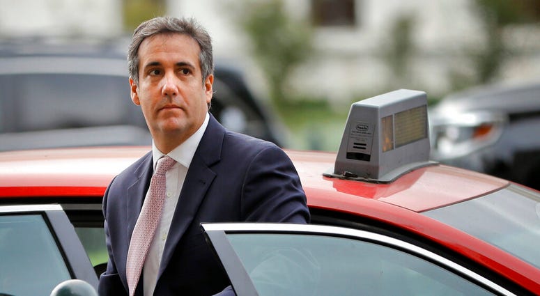 In this Sept. 19, 2017, file photo, Michael Cohen, President Donald Trump's personal attorney, steps out of a cab during his arrival on Capitol Hill in Washington. (AP Photo/Pablo Martinez Monsivais, file)
