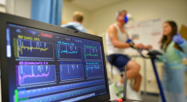 FILE - In this Aug. 27, 2014 file photo, a laptop computer monitors a patient's heart function as he takes a stress test while riding a stationary bike in Augusta, Ga. (AP Photo/The Augusta Chronicle, Michael Holahan) FILE - In this Aug. 27, 2014 file photo, a laptop computer monitors a patient's heart function as he takes a stress test while riding a stationary bike in Augusta, Ga. (AP Photo/The Augusta Chronicle, Michael Holahan)