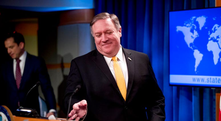 Secretary of State Mike Pompeo arrives for a news conference at the State Department in Washington, Friday, Feb. 1, 2019. (AP Photo/Andrew Harnik)