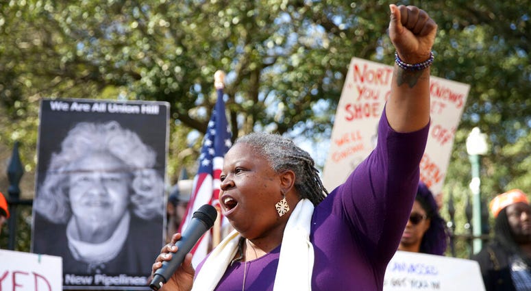 Pastor Lacette Cross, of Restoration Fellowship RVA, speaks during a protest calling for Governor Ralph Northam to resign on Monday Feb. 4, 2019. (Shelby Lum/Richmond Times-Dispatch via AP) Pastor Lacette Cross, of Restoration Fellowship RVA, speaks during a protest calling for Governor Ralph Northam to resign on Monday Feb. 4, 2019. (Shelby Lum/Richmond Times-Dispatch via AP)