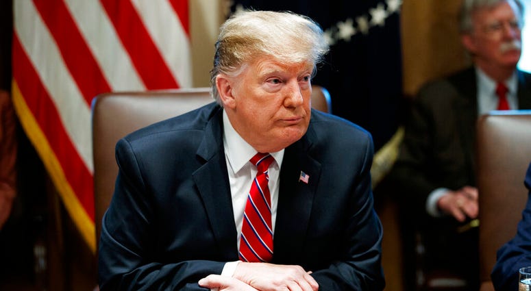 President Donald Trump listens to a question during a cabinet meeting at the White House, Tuesday, Feb. 12, 2019, in Washington. (AP Photo/ Evan Vucci)