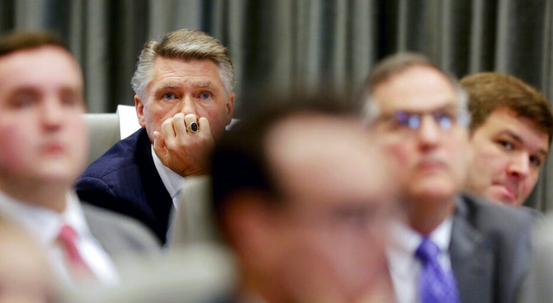 Mark Harris listens to the public evidentiary hearing on the 9th Congressional District investigation Monday, Feb. 18, 2019, at the North Carolina State Bar in Raleigh, N.C. (Juli Leonard/The News & Observer via AP, Pool)