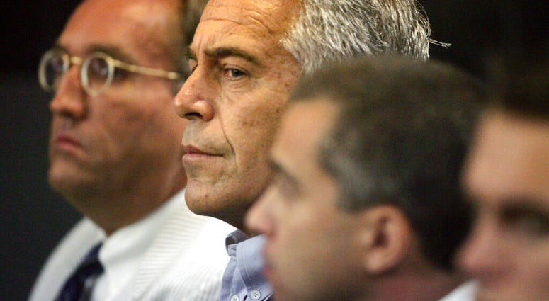 FILE- In this July 30, 2008 file photo, Jeffrey Epstein is shown in custody in West Palm Beach, Fla. U.S. District Judge Kenneth Marra ruled Thursday, Feb. 21, 2019, that federal prosecutors violated the rights of victims by secretly reaching a non-prosec