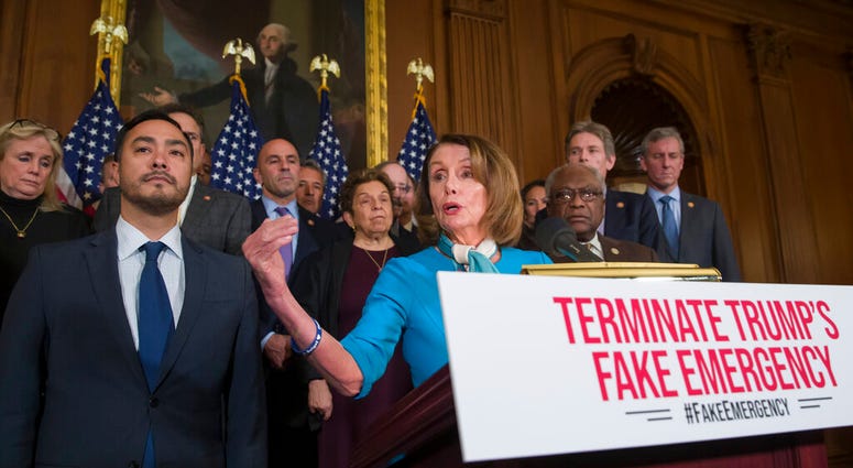 House Speaker Nancy Pelosi with House Democrats