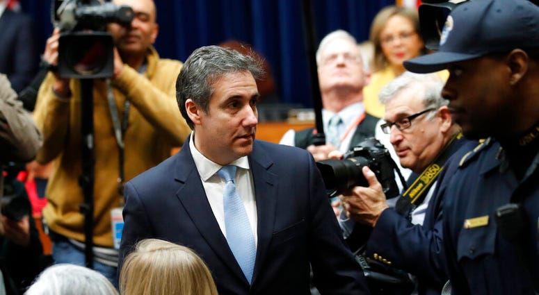 Michael Cohen, President Donald Trump's former personal lawyer, arrives to testify before the House Oversight and Reform Committee on Capitol Hill, Wednesday, Feb. 27, 2019, in Washington. (AP Photo/Alex Brandon)