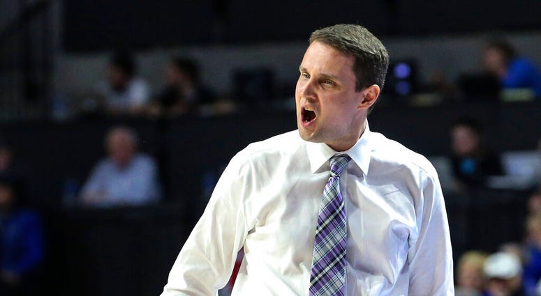 LSU coach Will Wade shouts during the first half of the team's NCAA college basketball game against Florida in Gainesville, Fla., Wednesday, March 6, 2019. (AP Photo/Gary McCullough)