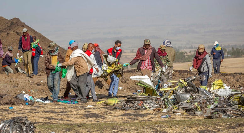 Search crews at the crash scene near Addis Ababa, Ethiopia
