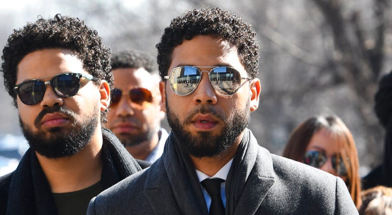 "Empire" actor Jussie Smollett, center, arrives at Leighton Criminal Court Building for a hearing to discuss whether cameras will be allowed in the courtroom during his disorderly conduct case on Tuesday, March 12, 2019, in Chicago. (AP Photo/Matt Marton) "Empire" actor Jussie Smollett, center, arrives at Leighton Criminal Court Building for a hearing to discuss whether cameras will be allowed in the courtroom during his disorderly conduct case on Tuesday, March 12, 2019, in Chicago. (AP Photo/Matt Marton)