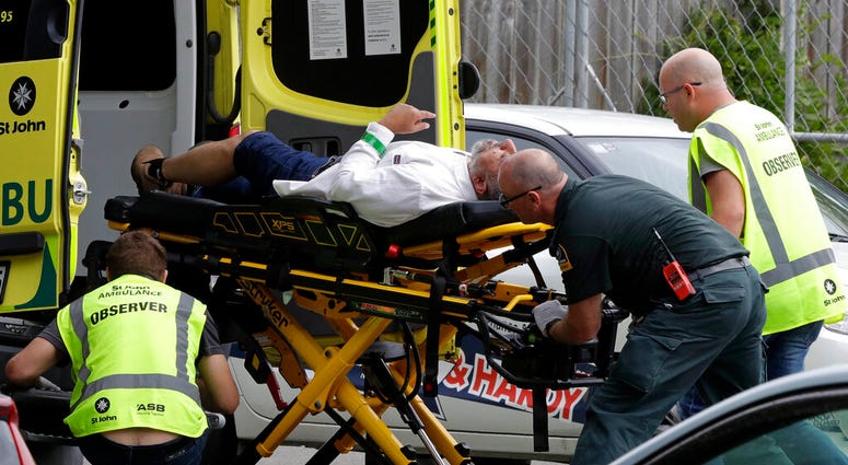 Injured man being loaded into an ambulance in Christchurch