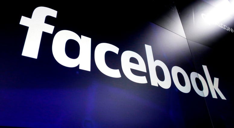 FILE - In this March 29, 2018, file photo, the logo for Facebook appears on screens in New York's Times Square. (AP Photo/Richard Drew, File) FILE - In this March 29, 2018, file photo, the logo for Facebook appears on screens in New York's Times Square. (AP Photo/Richard Drew, File)