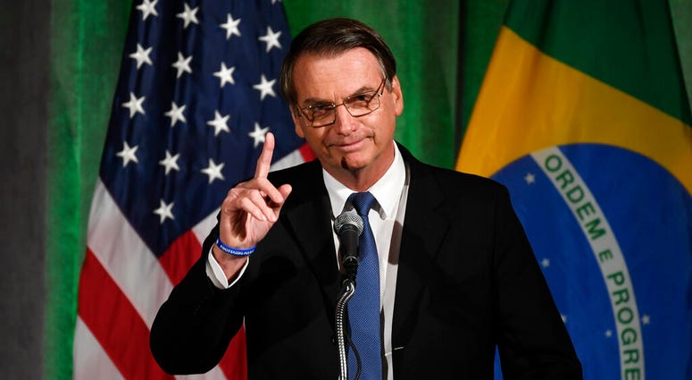 Brazilian President Jair Bolsonaro speaks at the Chamber of Commerce in Washington, Monday, March 18, 2019. (AP Photo/Susan Walsh) Brazilian President Jair Bolsonaro speaks at the Chamber of Commerce in Washington, Monday, March 18, 2019. (AP Photo/Susan Walsh)