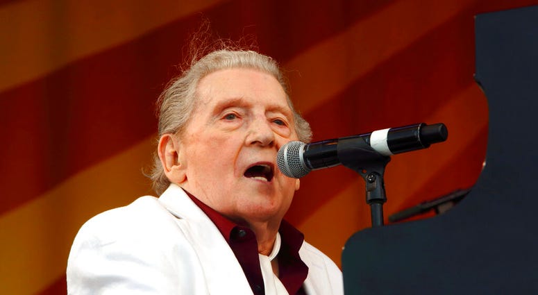 FILE - In this May 2, 2015 file photo, Jerry Lee Lewis performs at the New Orleans Jazz & Heritage Festival in New Orleans. Photo by John Davisson/Invision/AP, File) FILE - In this May 2, 2015 file photo, Jerry Lee Lewis performs at the New Orleans Jazz & Heritage Festival in New Orleans. Photo by John Davisson/Invision/AP, File)