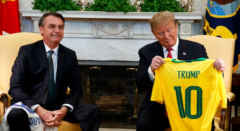 President Donald Trump speaks during a meeting with Brazilian President Jair Bolsonaro in the Oval Office of the White House, Tuesday, March 19, 2019, in Washington. (AP Photo/Evan Vucci) President Donald Trump speaks during a meeting with Brazilian President Jair Bolsonaro in the Oval Office of the White House, Tuesday, March 19, 2019, in Washington. (AP Photo/Evan Vucci)