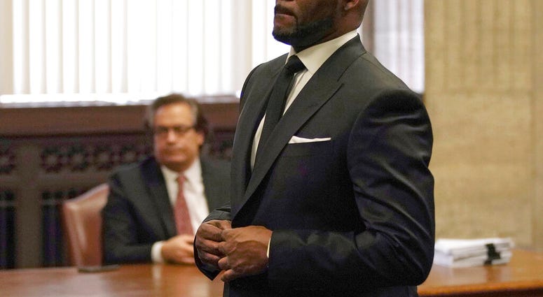 R. Kelly appears for a hearing at the Leighton Criminal Court Building on Friday, March 22, 2019 in Chicago. (E. Jason Wambsgans/Chicago Tribune via AP, Pool) R. Kelly appears for a hearing at the Leighton Criminal Court Building on Friday, March 22, 2019 in Chicago. (E. Jason Wambsgans/Chicago Tribune via AP, Pool)