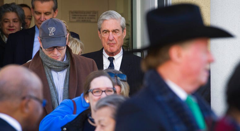 Special Counsel Robert Mueller walks past the White House after attending services at St. John's Episcopal Church, in Washington, Sunday, March 24, 2019. Mueller closed his long and contentious Russia investigation with no new charges, ending the probe th