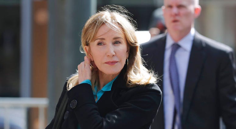 Actress Felicity Huffman arrives at federal court in Boston on Wednesday, April 3, 2019, to face charges in a nationwide college admissions bribery scandal. (AP Photo/Charles Krupa) Actress Felicity Huffman arrives at federal court in Boston on Wednesday, April 3, 2019, to face charges in a nationwide college admissions bribery scandal. (AP Photo/Charles Krupa)