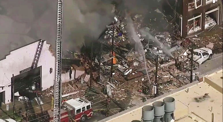 In this image taken from video firefighters and emergency officials respond to an explosion and fire in downtown Durham, N.C. on Wednesday, April 10, 2019. (WTVD-TV ABC 11 via AP) In this image taken from video firefighters and emergency officials respond to an explosion and fire in downtown Durham, N.C. on Wednesday, April 10, 2019. (WTVD-TV ABC 11 via AP)