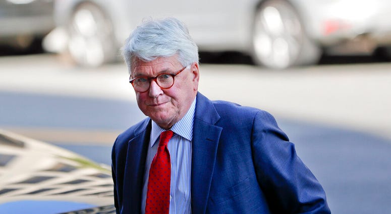 In this Oct. 17, 2016, photo, attorney Gregory Craig arrives at U.S. District Court in Washington. (AP Photo/Pablo Martinez Monsivais)