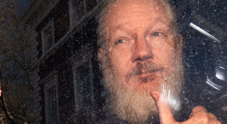 Julian Assange following his arrest in London