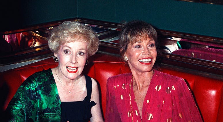 FILE - In this Aug. 30, 1992, file photo, Mary Tyler Moore, right, is joined by former "Mary Tyler Moore Show" co-star Georgia Engel, left. (AP Photo/Malcolm Clarke, File) FILE - In this Aug. 30, 1992, file photo, Mary Tyler Moore, right, is joined by former "Mary Tyler Moore Show" co-star Georgia Engel, left. (AP Photo/Malcolm Clarke, File)
