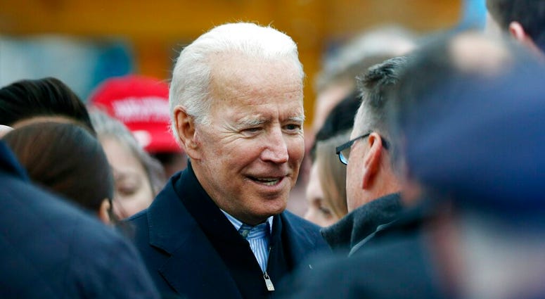 Former vice president Joe Biden talks with officials after speaking at a rally in support of striking Stop & Shop workers in Boston, Thursday, April 18, 2019. (AP Photo/Michael Dwyer) Former vice president Joe Biden talks with officials after speaking at a rally in support of striking Stop & Shop workers in Boston, Thursday, April 18, 2019. (AP Photo/Michael Dwyer)
