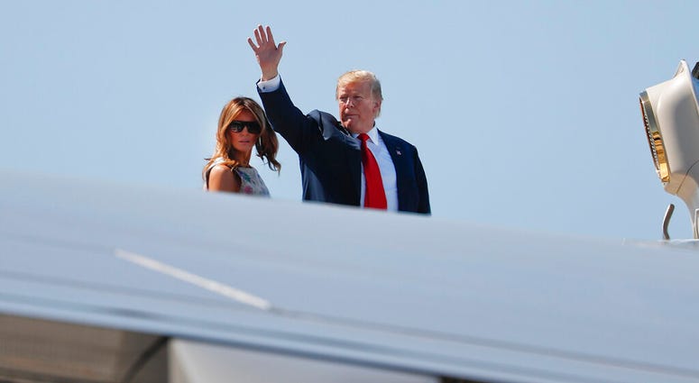 President Donald Trump, right, waves as he and first lady Melania Trump board Air Force One prior to departure from Palm Beach International Airport, Sunday, April 21, 2019, in West Palm Beach Fla. (AP Photo/Pablo Martinez Monsivais) President Donald Trump, right, waves as he and first lady Melania Trump board Air Force One prior to departure from Palm Beach International Airport, Sunday, April 21, 2019, in West Palm Beach Fla. (AP Photo/Pablo Martinez Monsivais)