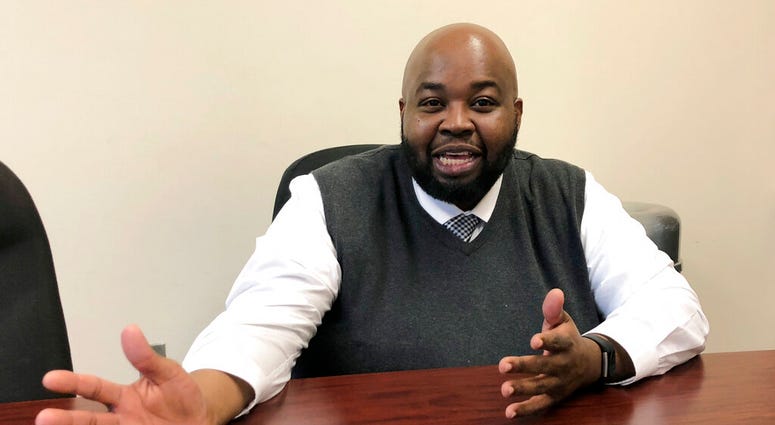 In this Thursday, April 18, 2019 photo Rodney Robinson, of Richmond, Va., gestures during an interview at the Virgie Binford Educational Center, a school inside the Richmond Juvenile Detention Center in Richmond, Va. (AP Photo/Denise Levoie) In this Thursday, April 18, 2019 photo Rodney Robinson, of Richmond, Va., gestures during an interview at the Virgie Binford Educational Center, a school inside the Richmond Juvenile Detention Center in Richmond, Va. (AP Photo/Denise Levoie)