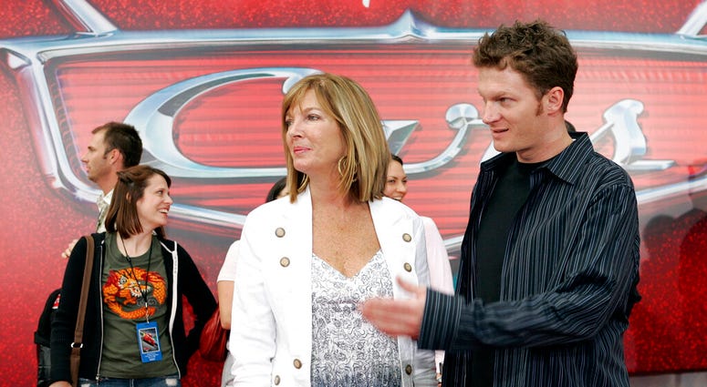 FILE - In this May 26, 2006, file photo, NASCAR driver Dale Earnhardt Jr., right, and his mother Brenda Jackson, front left, arrive for the premiere of the Disney/Pixar animated film "Cars" at Lowe's Motor Speedway in Concord, N.C. (AP Photo/Chuck Burton FILE - In this May 26, 2006, file photo, NASCAR driver Dale Earnhardt Jr., right, and his mother Brenda Jackson, front left, arrive for the premiere of the Disney/Pixar animated film "Cars" at Lowe's Motor Speedway in Concord, N.C. (AP Photo/Chuck Burton