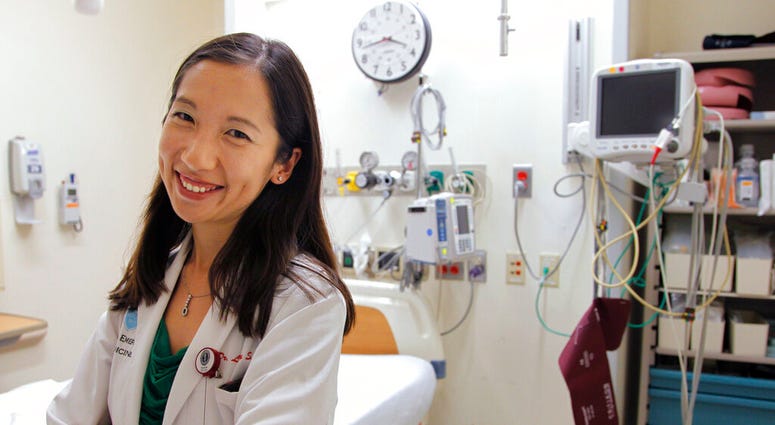 FILE - In this Aug. 14, 2012 file photo, Dr. Leana Wen stands in the emergency department at Brigham and Women's Hospital in Boston, during her medical residency. (AP Photo/Steven Senne, File) FILE - In this Aug. 14, 2012 file photo, Dr. Leana Wen stands in the emergency department at Brigham and Women's Hospital in Boston, during her medical residency. (AP Photo/Steven Senne, File)