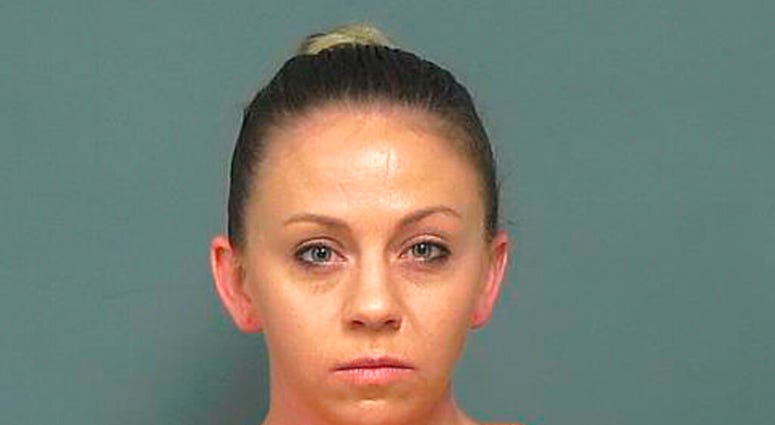 FILE - This file photo provided by the Mesquite Police Department shows Amber Guyger, taken Friday, Nov. 30, 2018. (Mesquite Police Department via AP) FILE - This file photo provided by the Mesquite Police Department shows Amber Guyger, taken Friday, Nov. 30, 2018. (Mesquite Police Department via AP)
