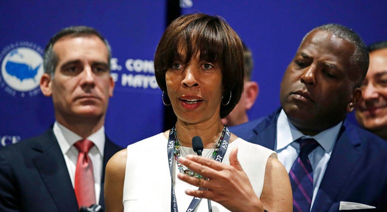 In this June 8, 2018 file photo, Baltimore Mayor Catherine Pugh addresses a gathering during the annual meeting of the U.S. Conference of Mayors in Boston. (AP Photo/Charles Krupa, File)