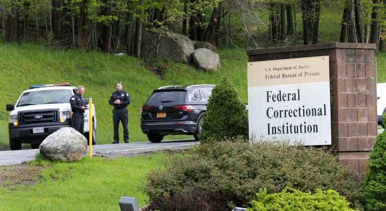 Security stand at the entrance to the Federal Correctional Institution in Otisville, N.Y., Monday, May 6, 2019. (AP Photo/Seth Wenig)