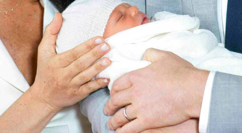 Britain's Prince Harry and Meghan, Duchess of Sussex, during a photocall with their newborn son, in St George's Hall at Windsor Castle, Windsor, south England. (Dominic Lipinski/Pool via AP) Britain's Prince Harry and Meghan, Duchess of Sussex, during a photocall with their newborn son, in St George's Hall at Windsor Castle, Windsor, south England. (Dominic Lipinski/Pool via AP)